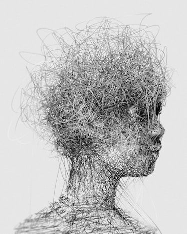 a black and white photo of a woman's head