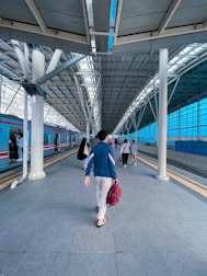 A modern train station bustling with activity.