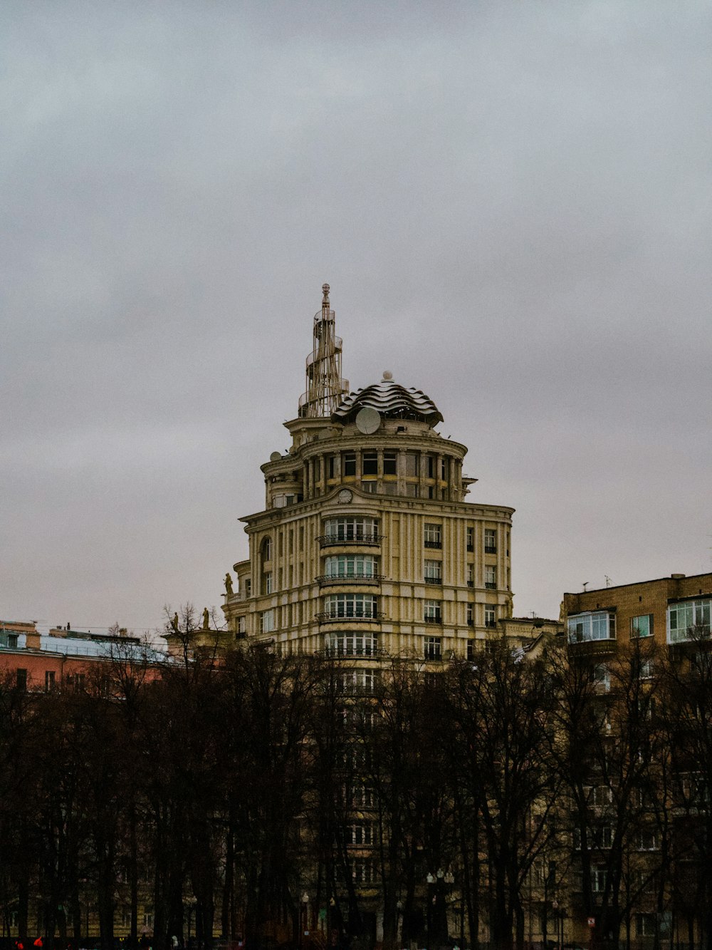 a tall building with a clock on the top of it