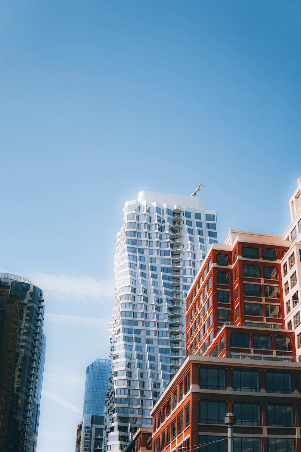 a group of tall buildings next to each other