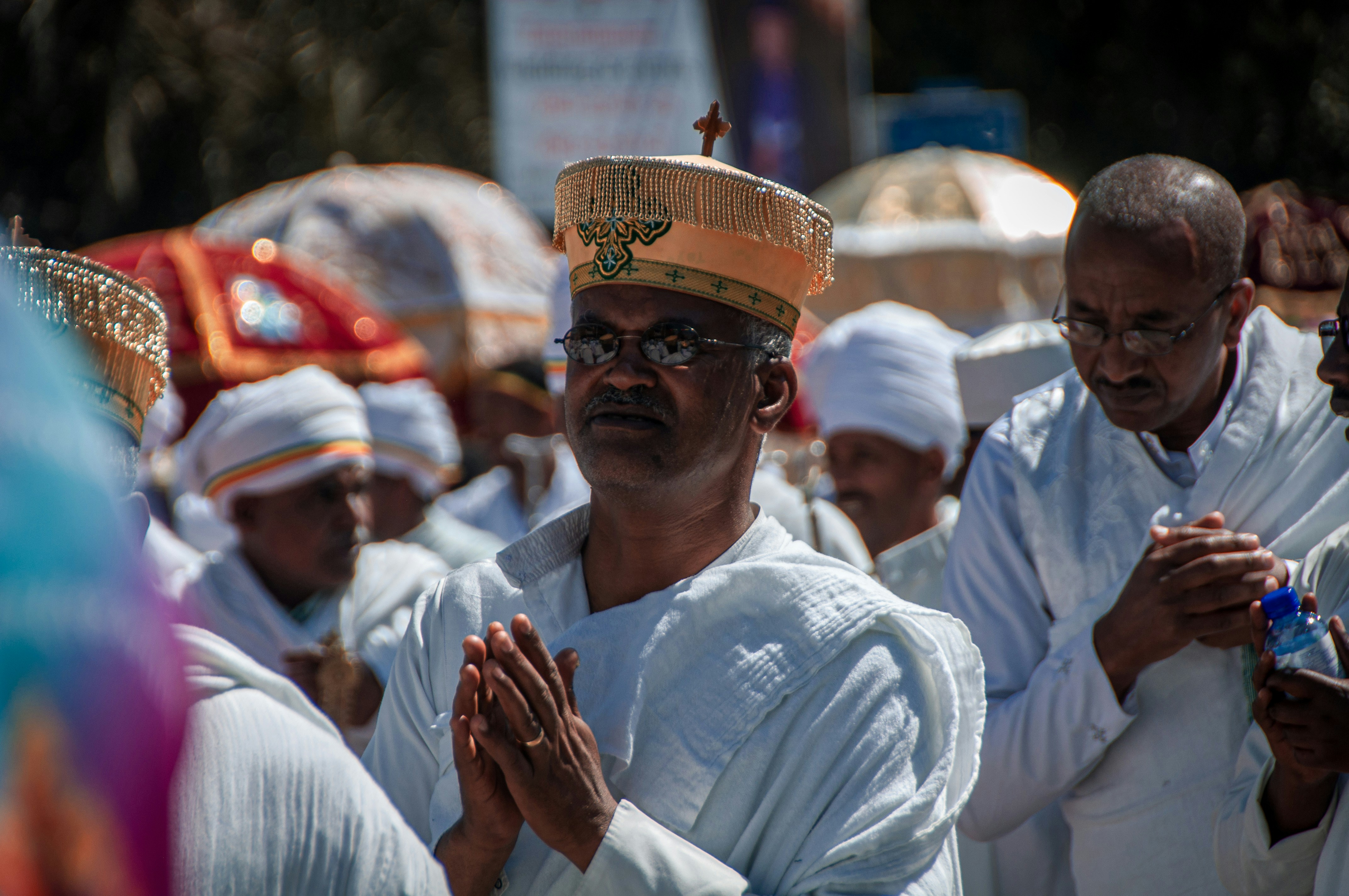 a group of men standing next to each other, Timkat, which translates as 