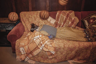 Comfortable lounge area with fridge, microwave, and mini basketball hoop.