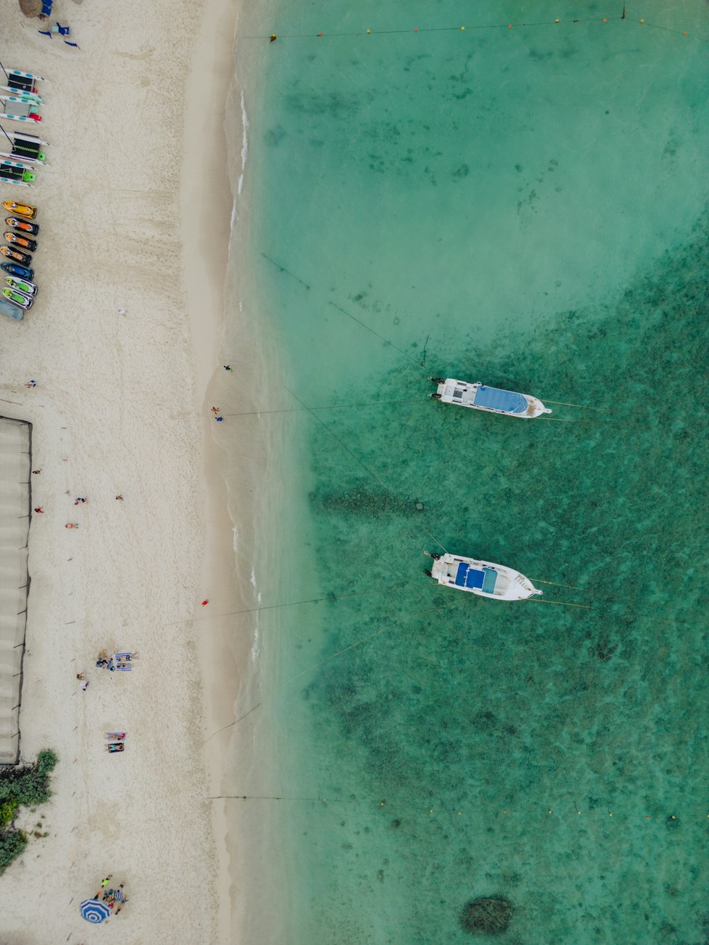 a couple of boats that are sitting in the water