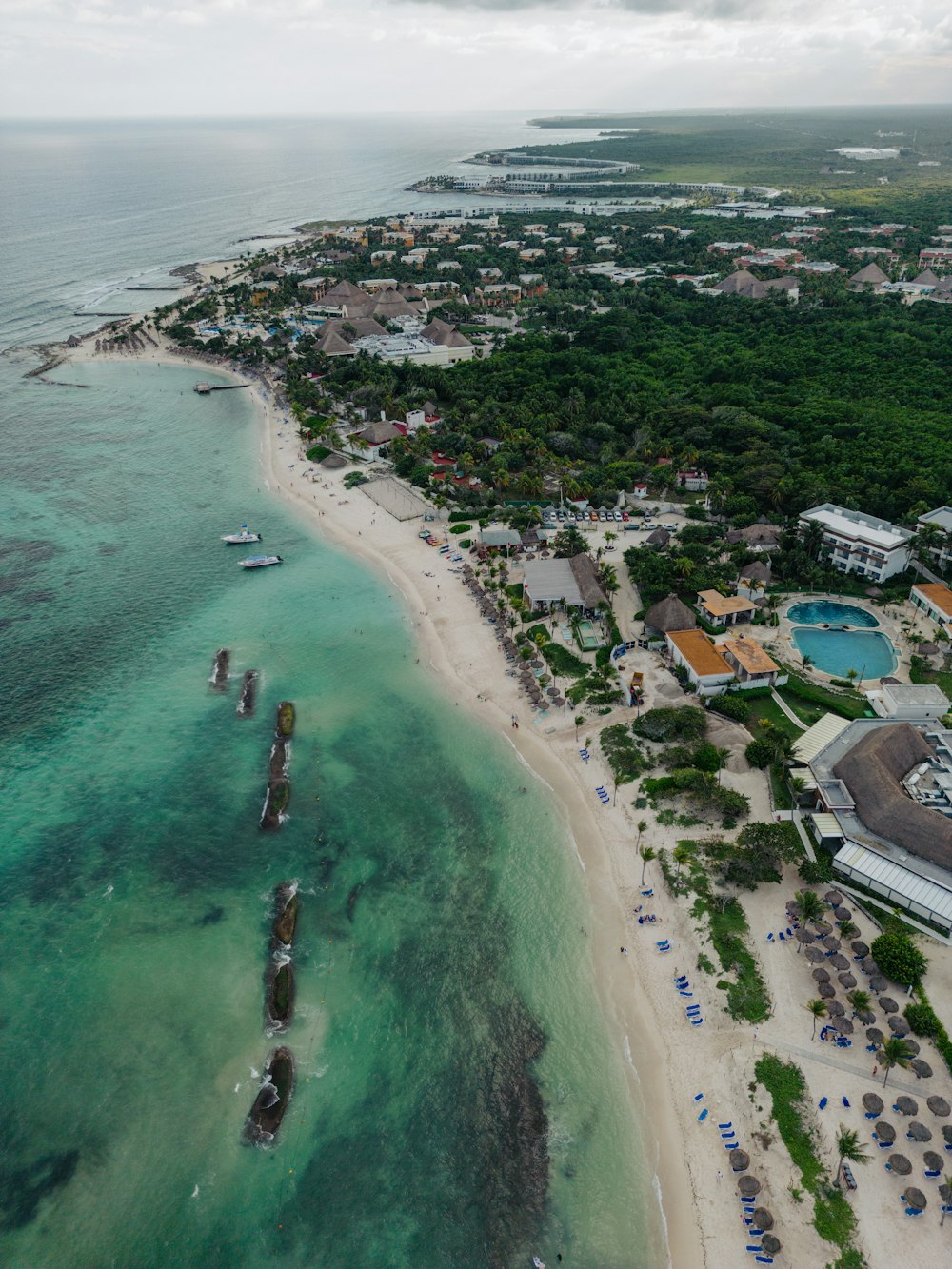 a bird's eye view of a resort and beach