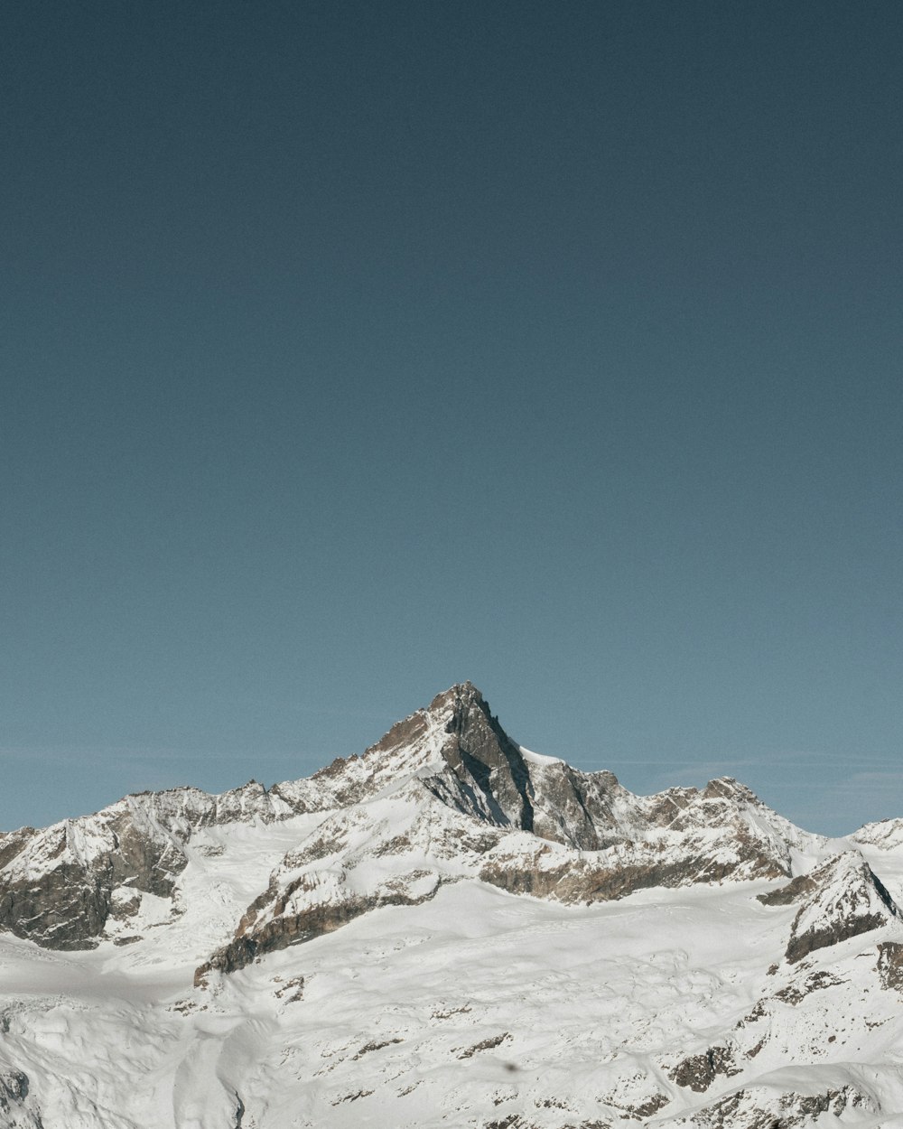 a person on skis is standing in the snow