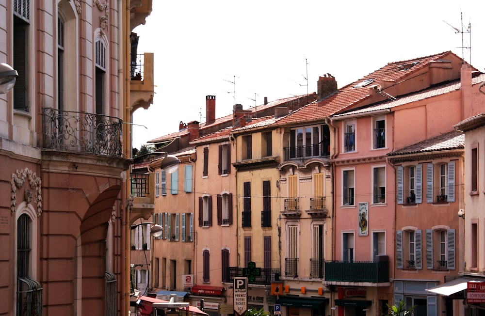 a row of buildings on a city street