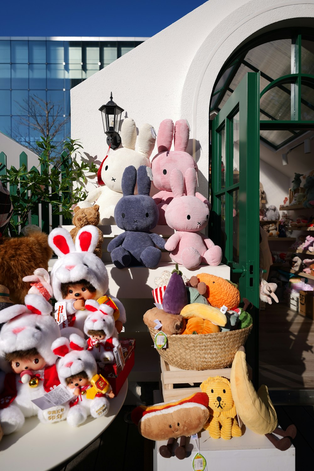 a group of stuffed animals sitting on top of a table