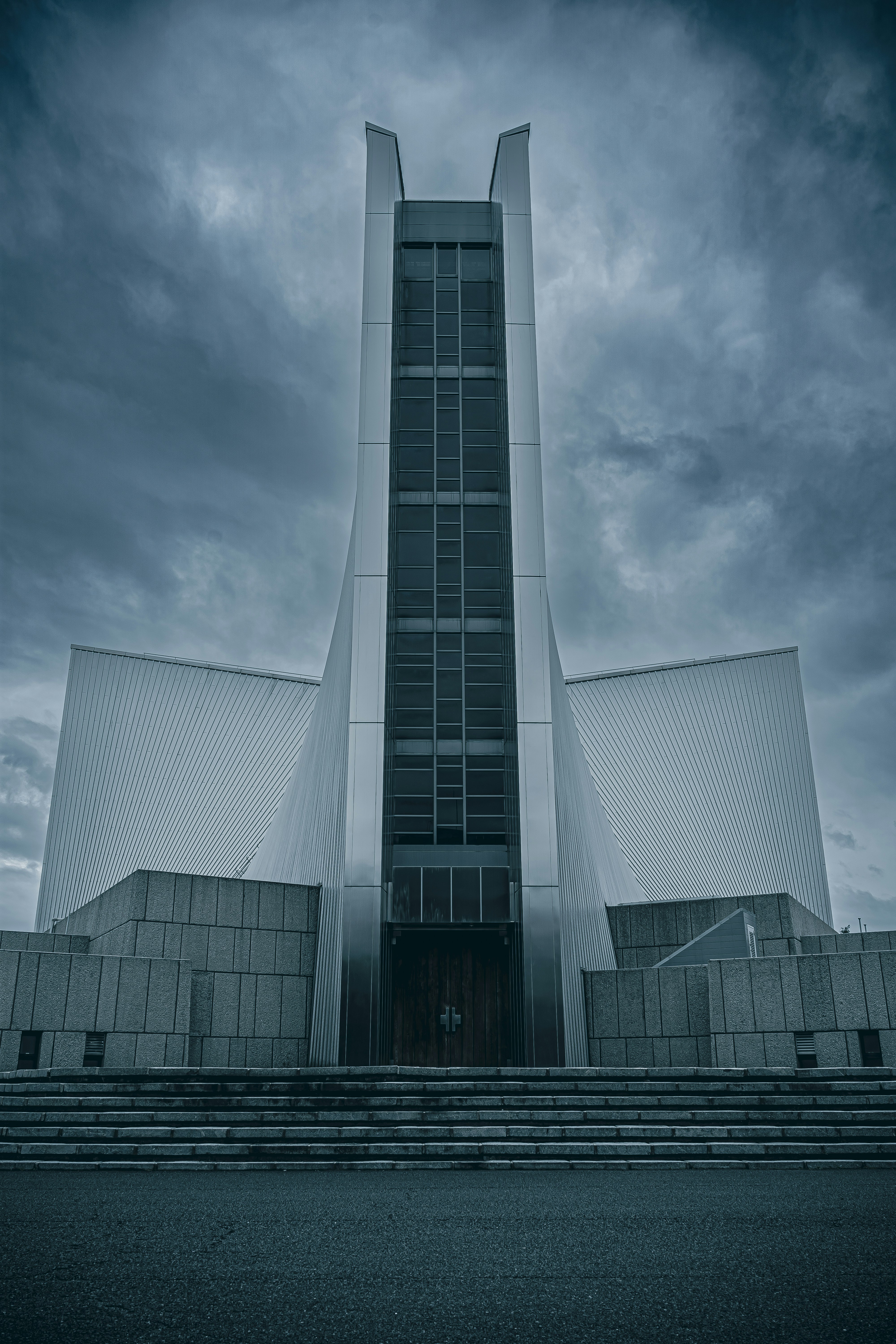 a tall building with a clock on the side of it