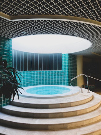 a round pool with steps leading up to it