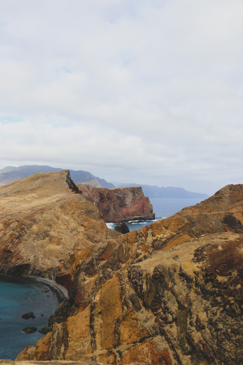 a large body of water surrounded by mountains