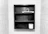 A black wooden shelf is mounted on a tiled wall. The shelf has three compartments with a hanger and a toothbrush on the middle shelf, while a roll of toilet paper is placed on the bottom shelf. The surrounding walls are covered in pale, textured tiles.