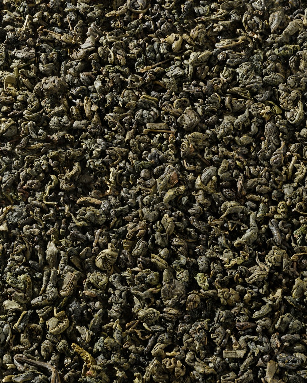 a close up of a pile of dried herbs