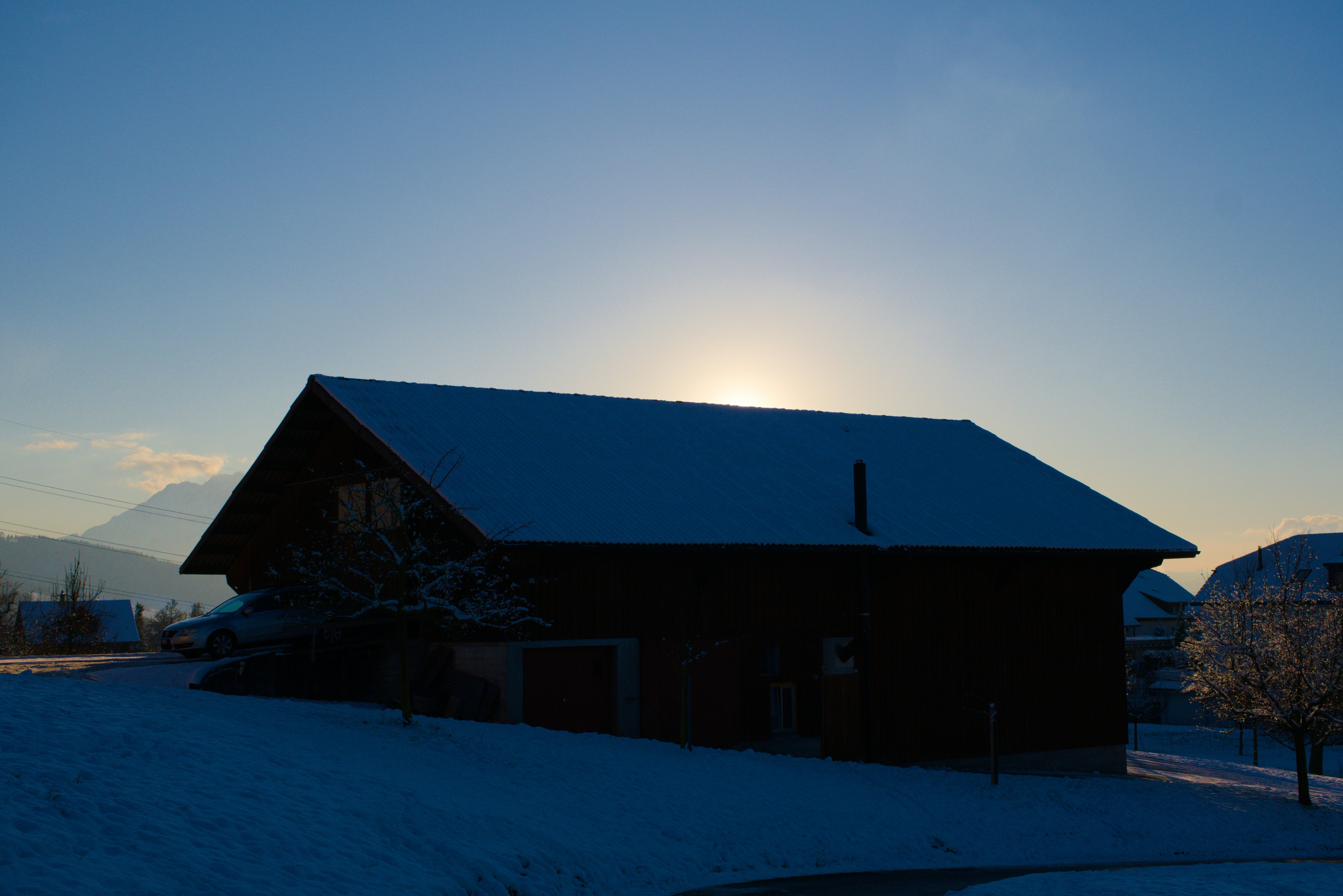 A barn in the middle of a snowy field photo – Free Nature Image on Unsplash