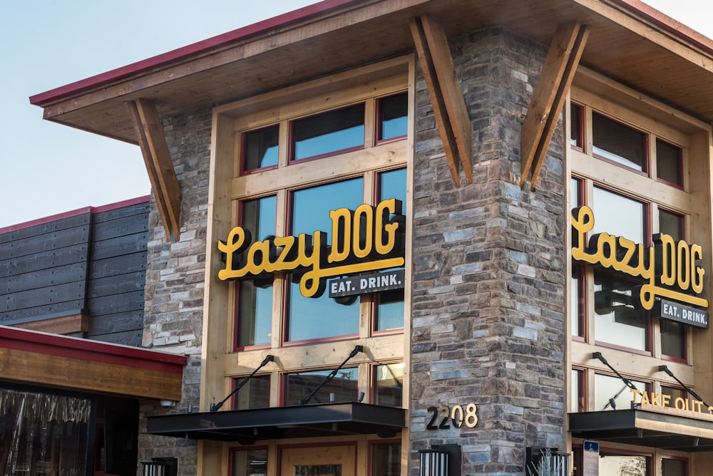 a restaurant called lazy dog with a sign that says lazy dog