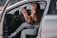 A happy customer using Telenix software in a driving school.