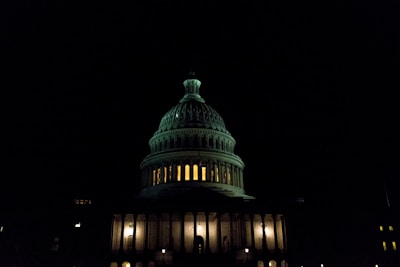 Historic Virginia State Capitol building bathed in warm afternoon light, symbolizing tradition and progress.