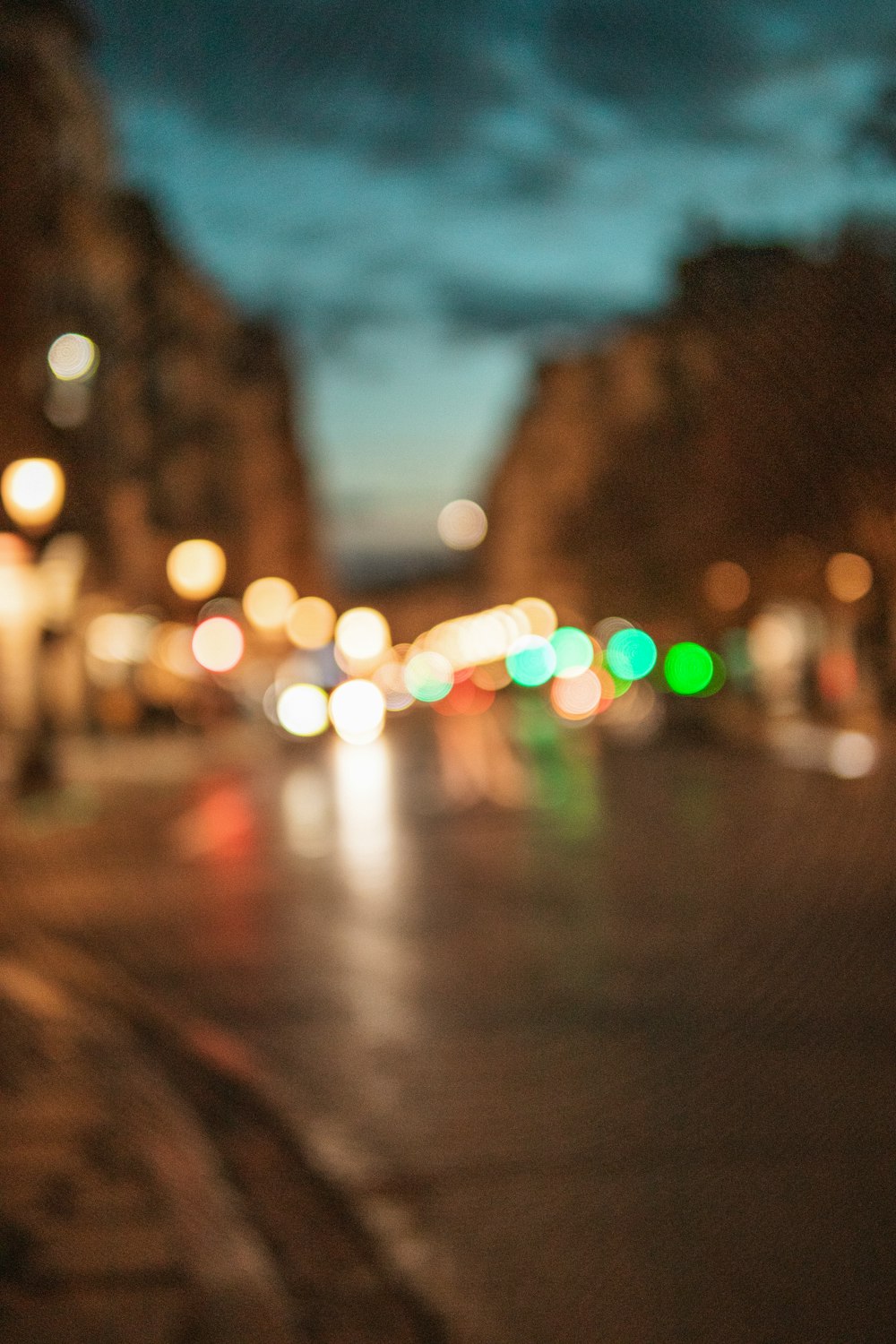 a blurry photo of a city street at night