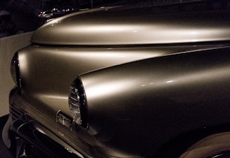 Before and after image of a restored car body showing shiny, smooth paint.