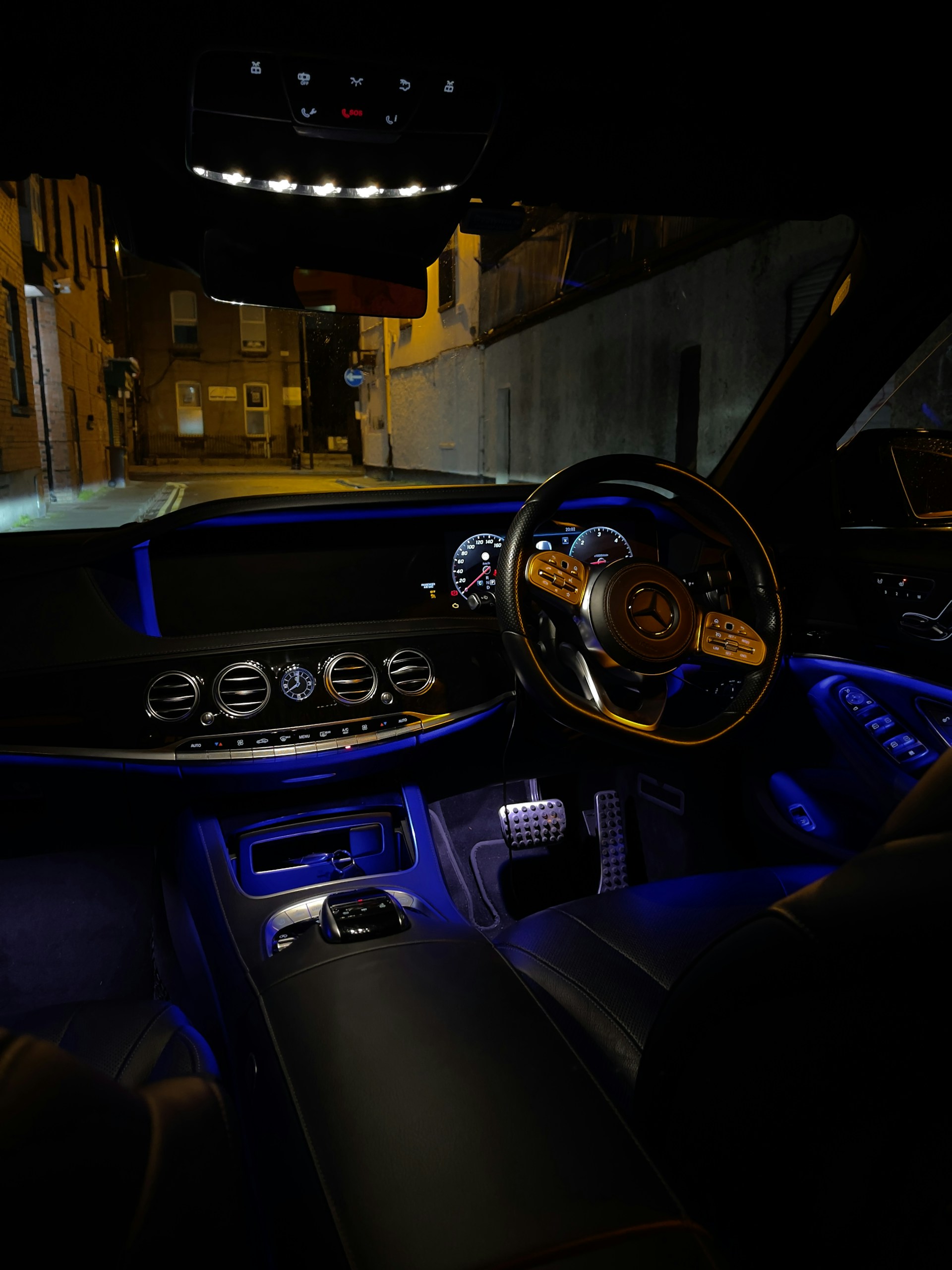 woman wearing yellow long-sleeved dress under white clouds and blue sky during daytime