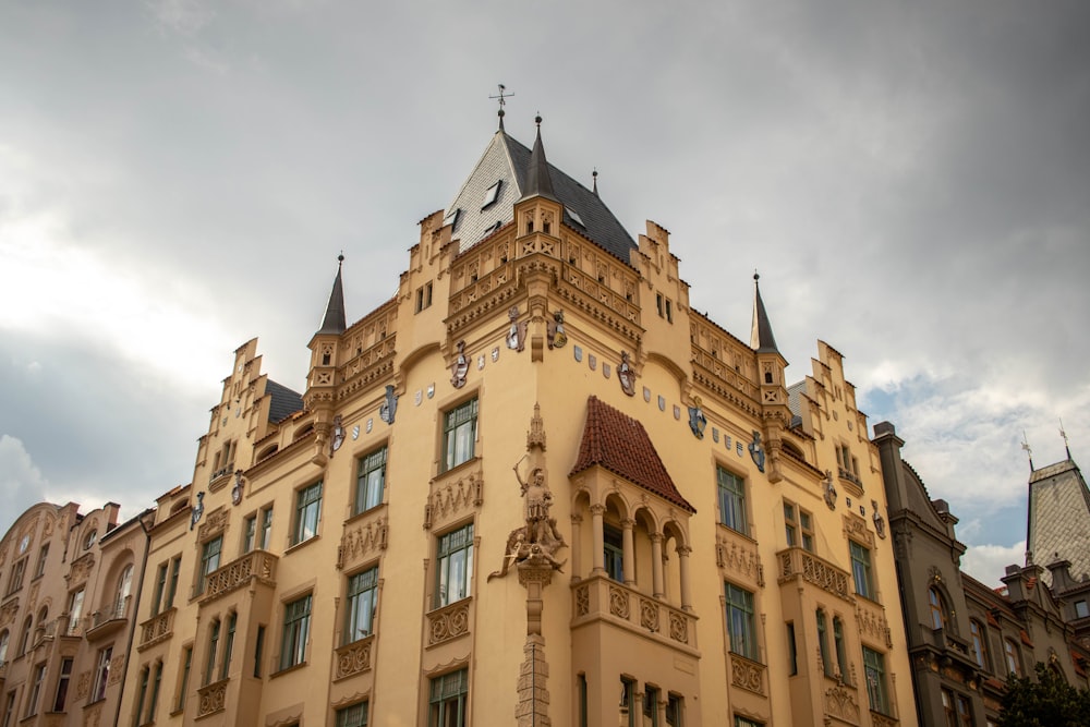 a tall building with a clock on the top of it