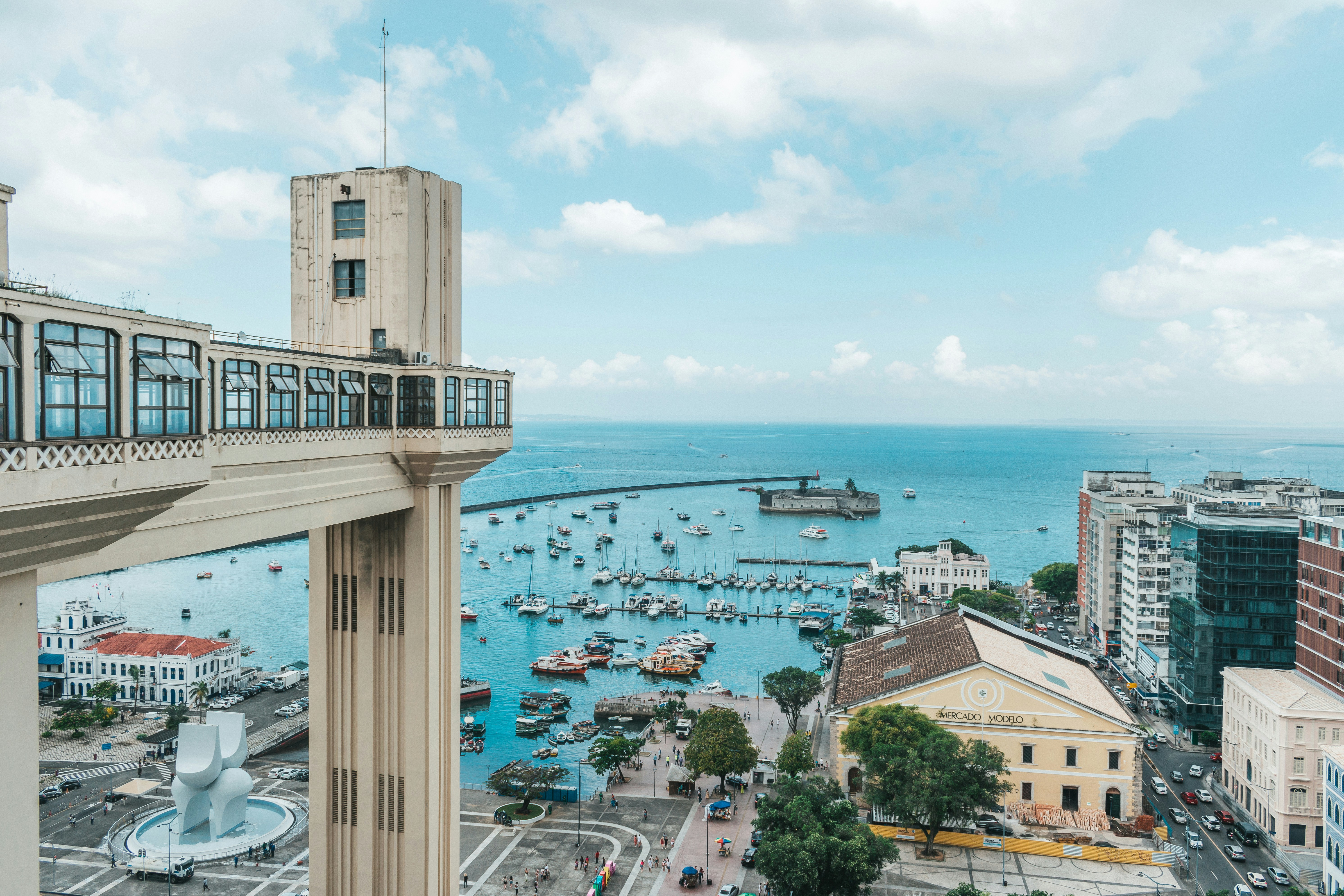 a view of a harbor with boats in the water