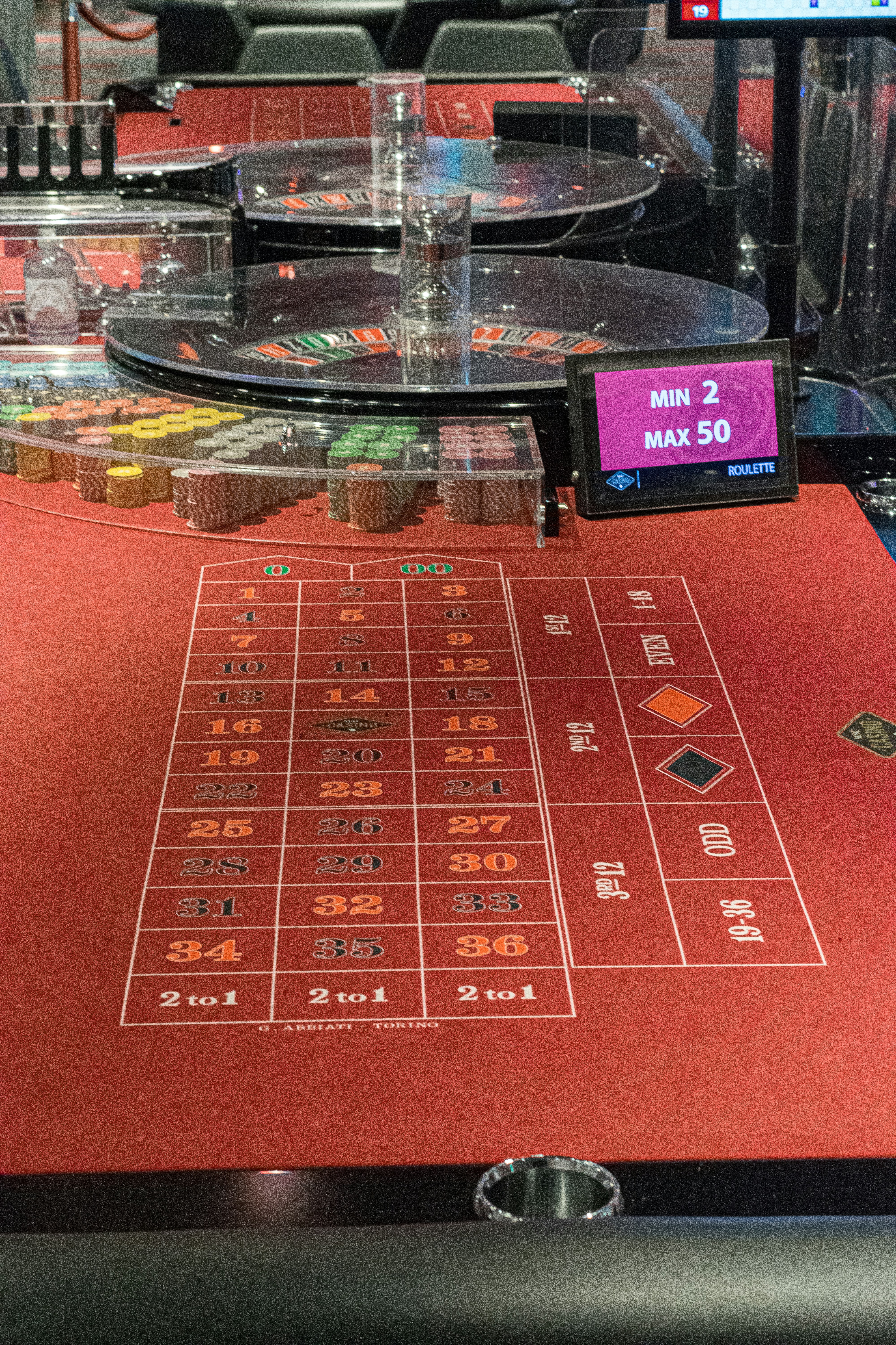 a rouleet table with a lot of chips on it