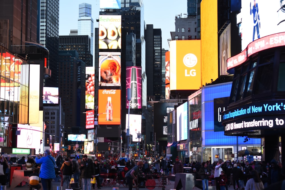 a city street filled with lots of tall buildings