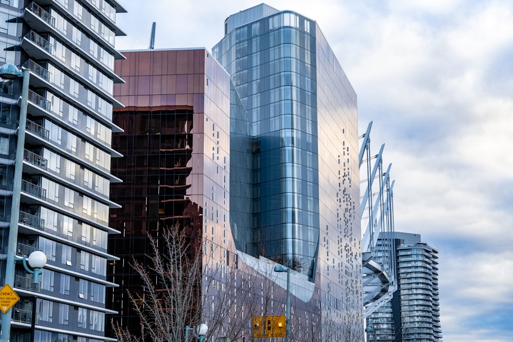 a group of tall buildings sitting next to each other