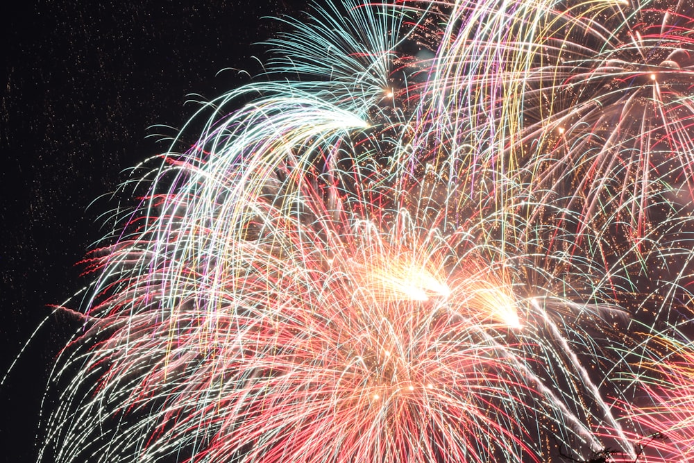 a large fireworks display in the night sky