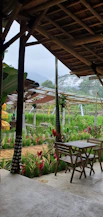 Cozy sitting area inside the Rice Field Suite with minimalist tropical decor.