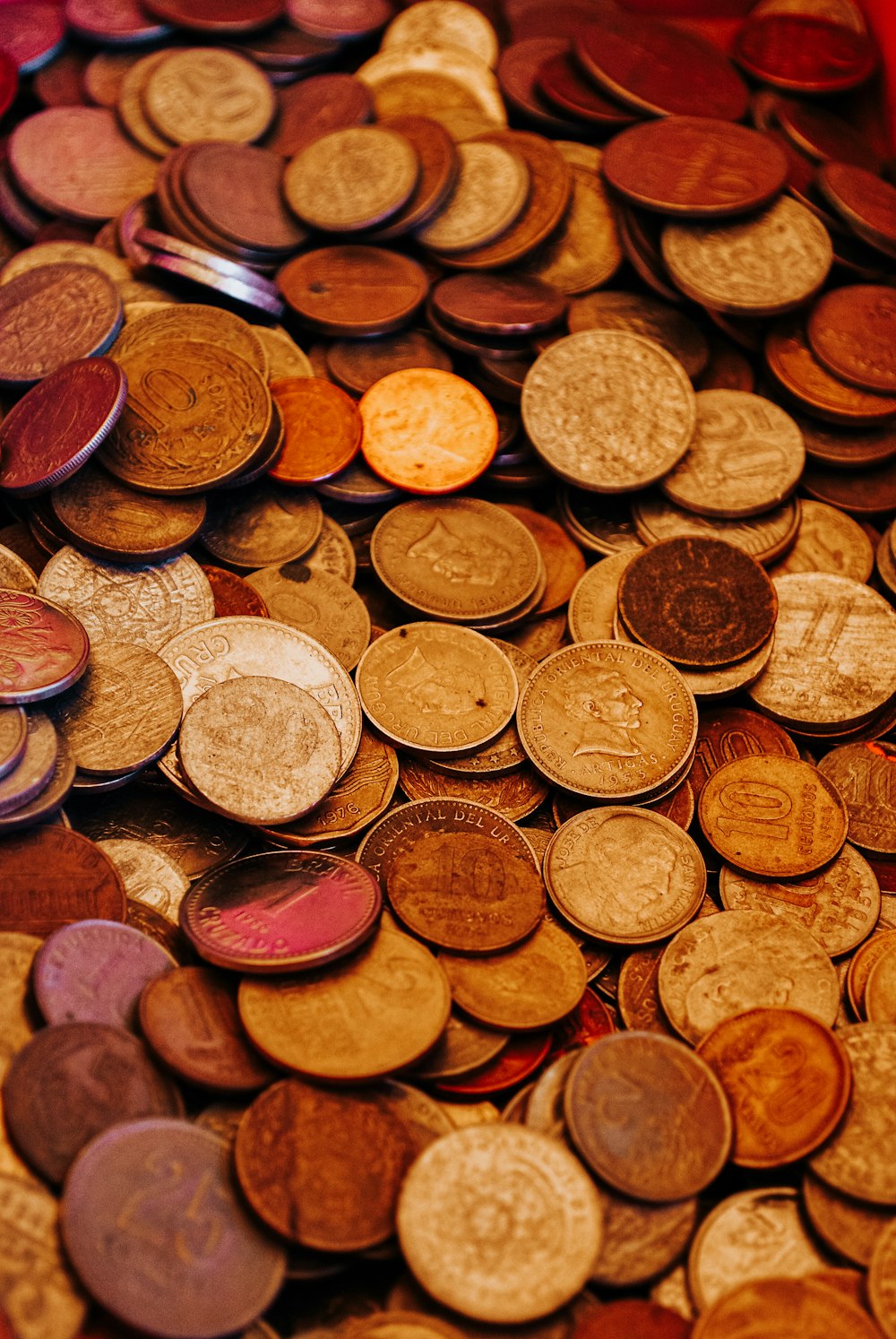 a pile of coins sitting on top of a table