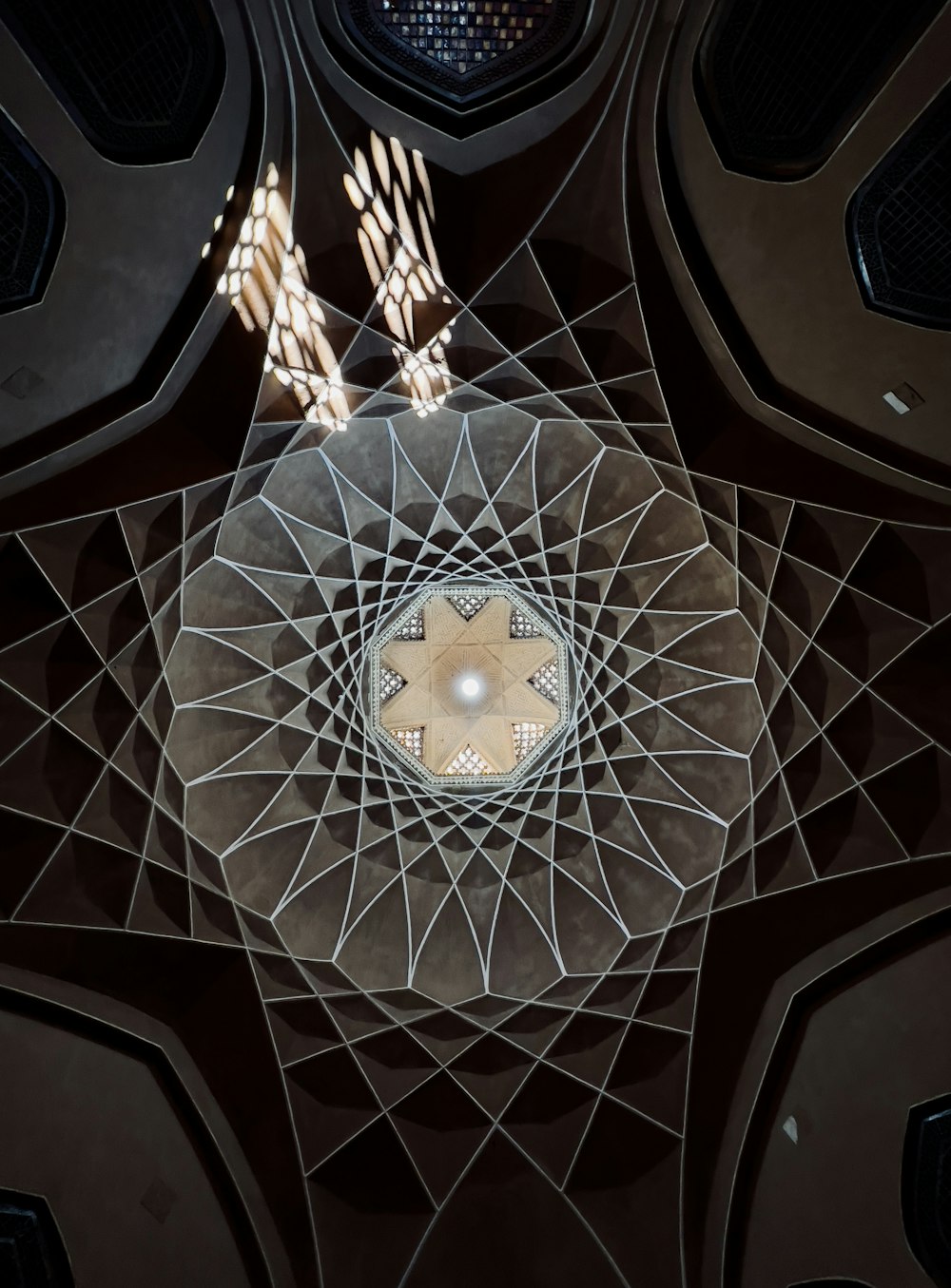 a clock that is on the ceiling of a building