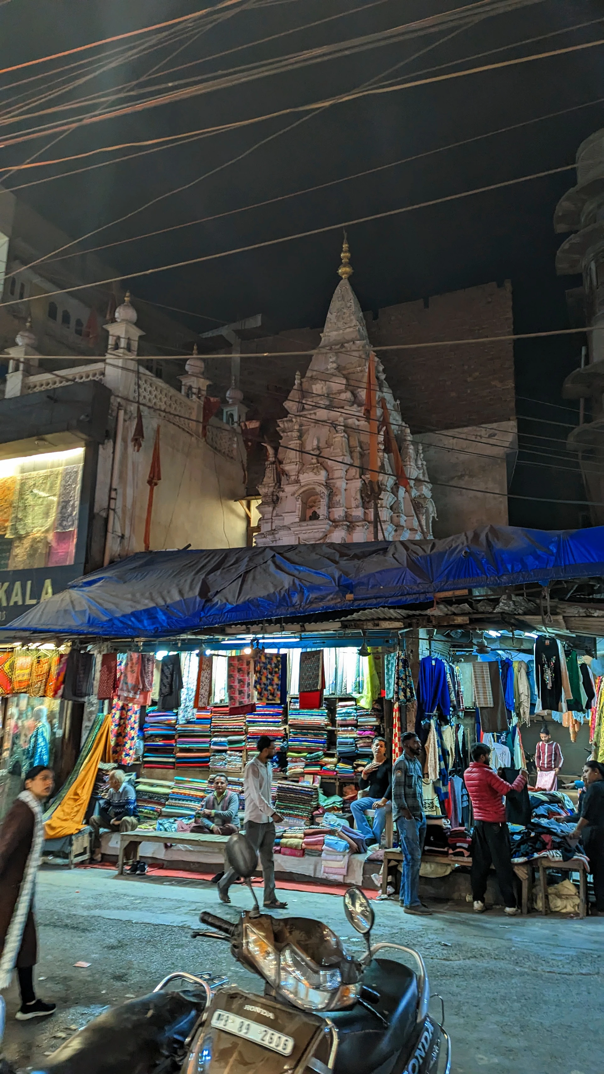woman wearing yellow long-sleeved dress under white clouds and blue sky during daytime
