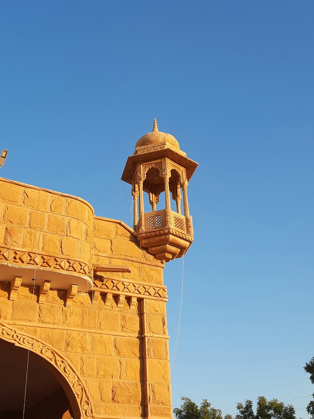 a tall tower with a clock on top of it