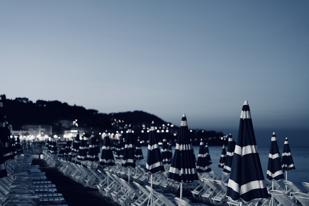 a row of beach chairs sitting next to each other