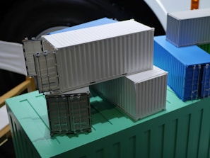 three containers are stacked on top of each other