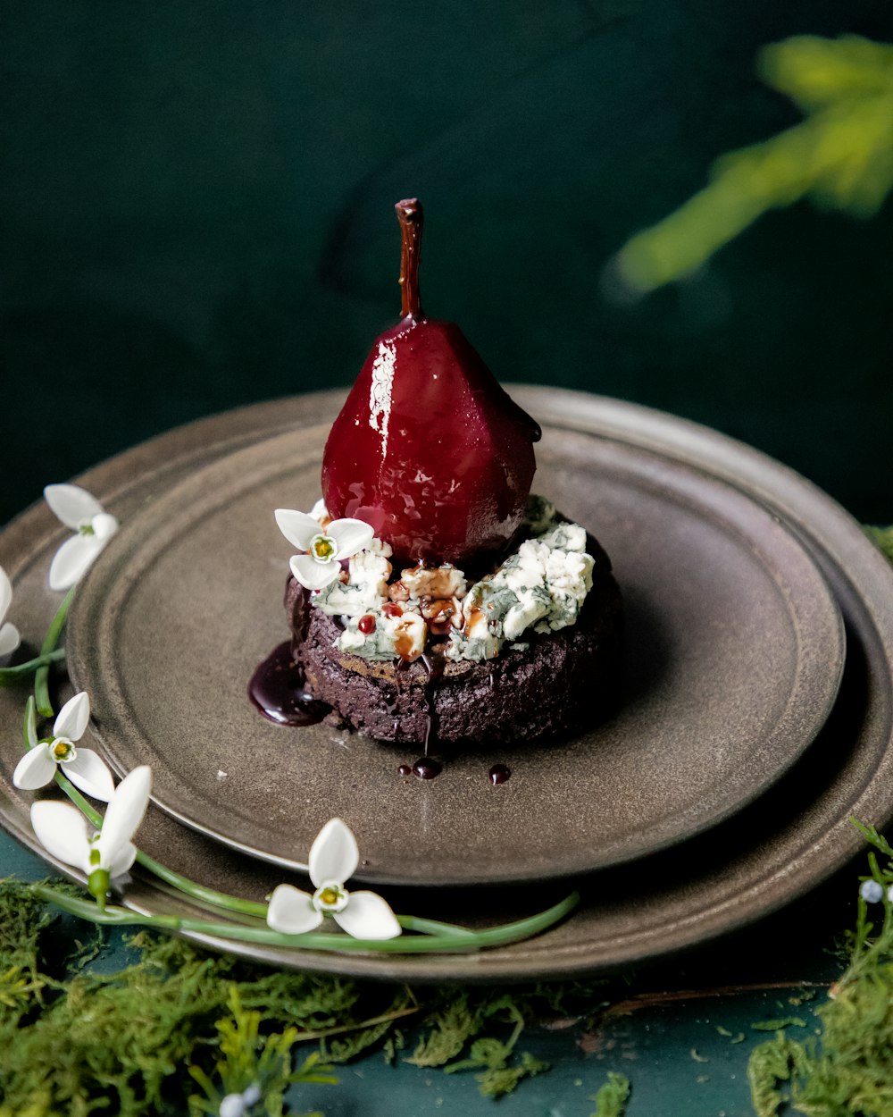 a chocolate dessert with a cherry on top of it