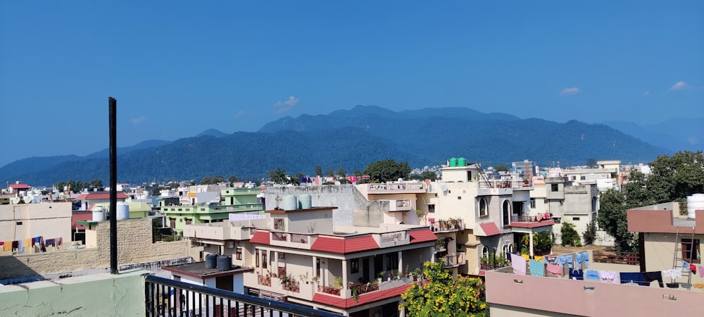 a view of a city with mountains in the background