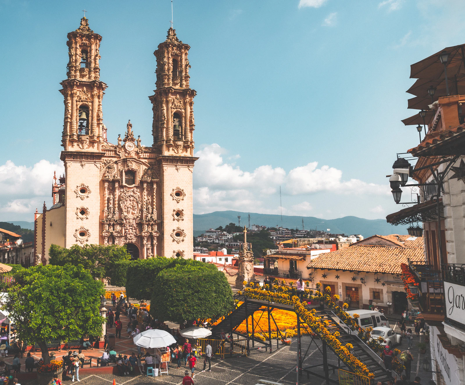 The pink towers of Santa Prisca above the white houses of Taxco