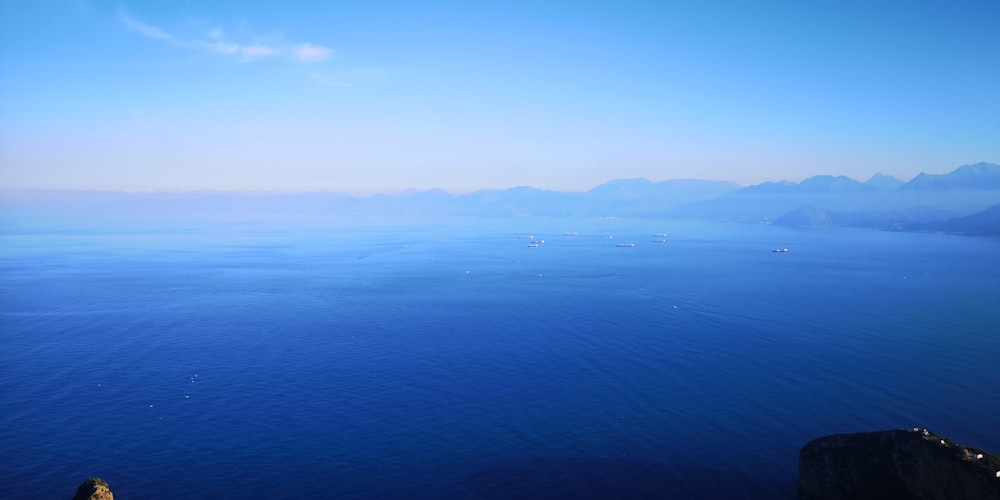 a large body of water surrounded by mountains