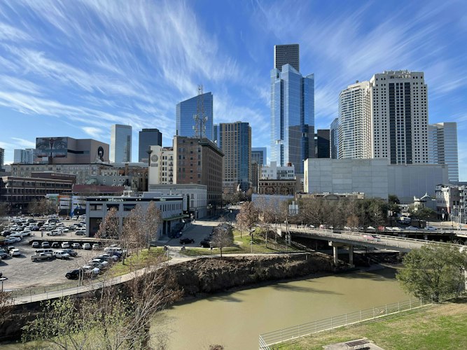Downtown Houston skyline above Buffalo Bayou