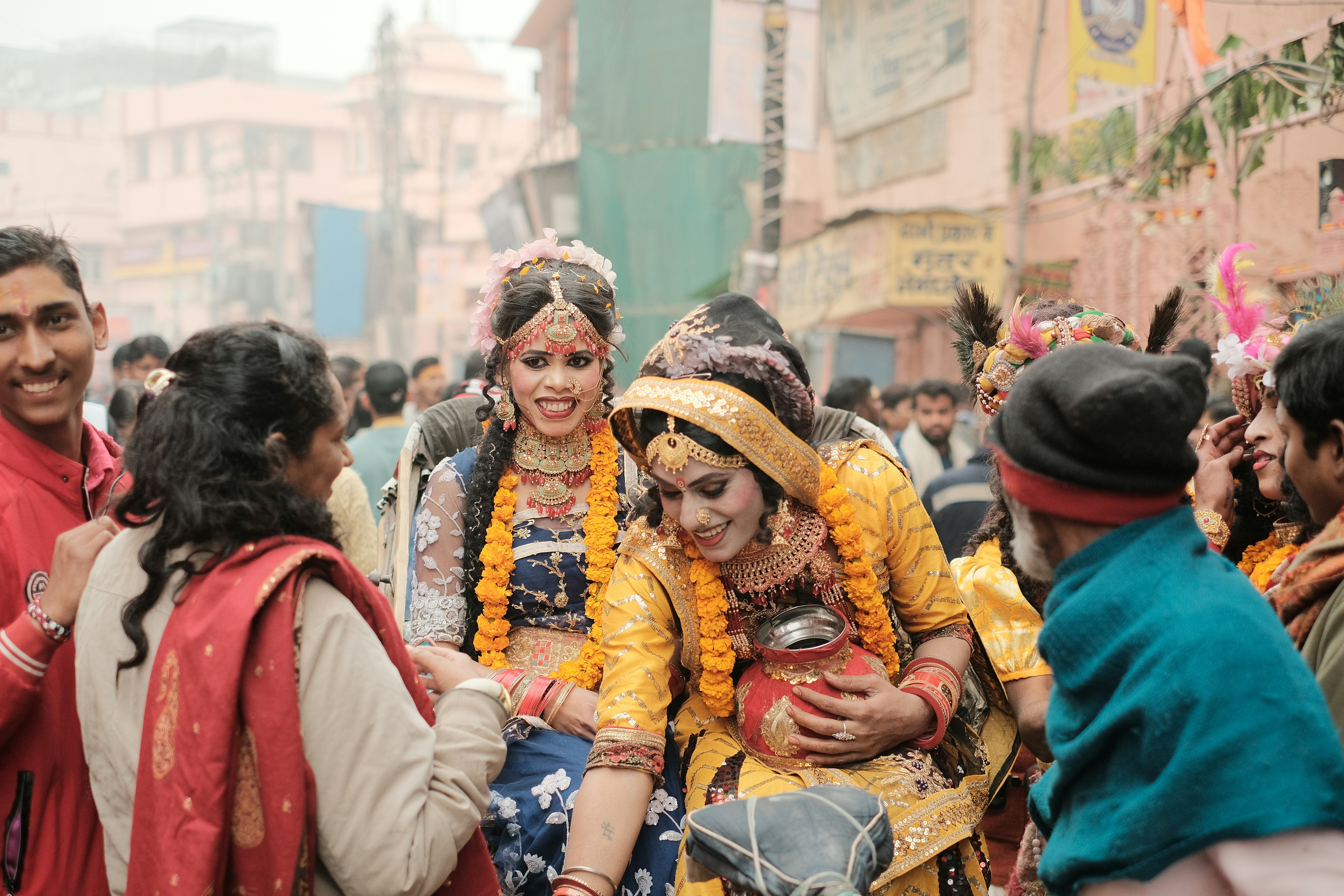 a group of people standing around each other