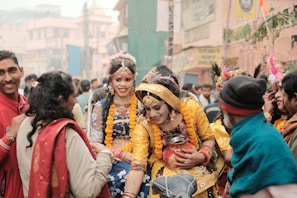 A vibrant street scene in India showcasing people engaged in conversation.