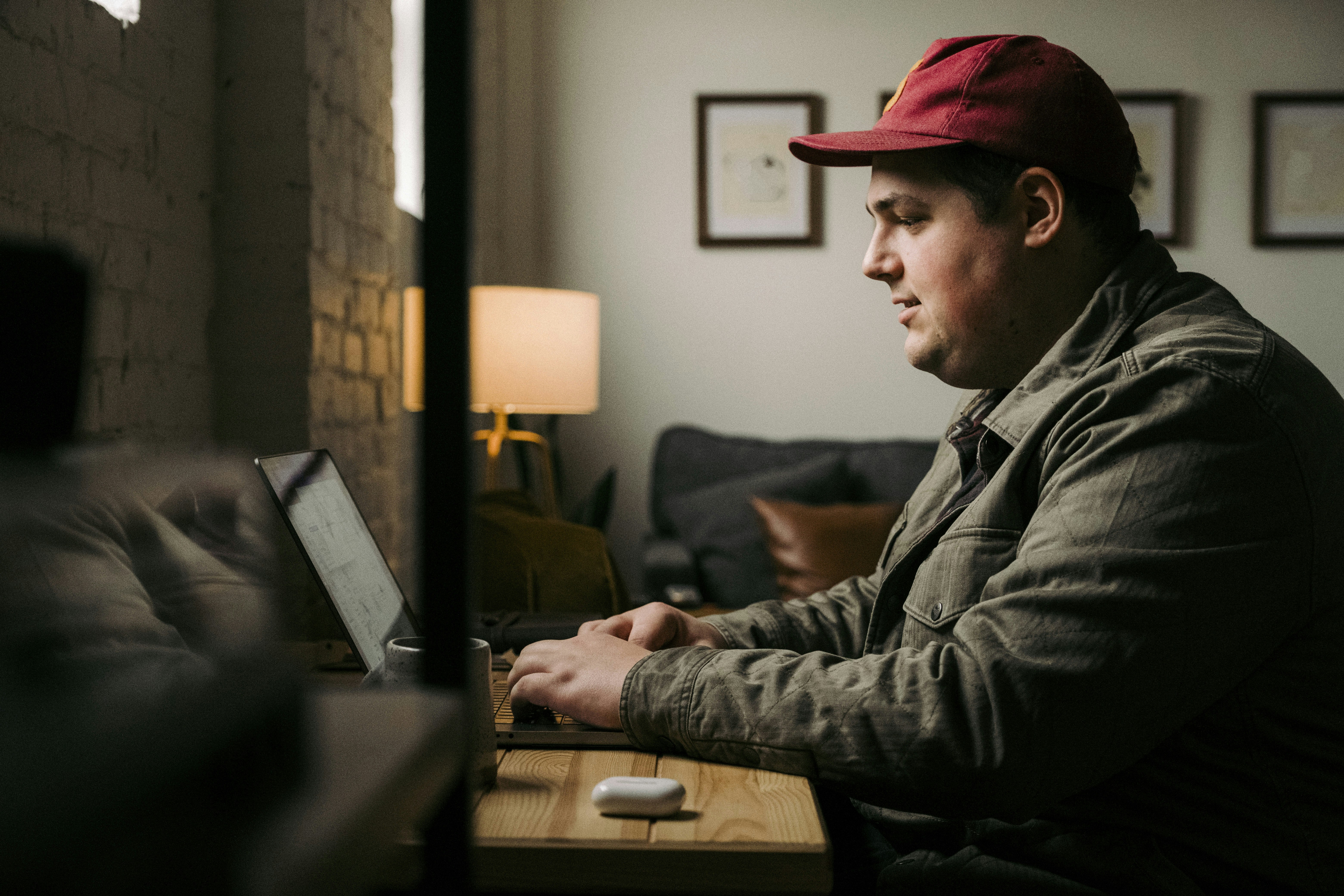 Person filling out an online application form on a laptop - apply for food stamps