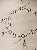 A close-up of a water analysis report with technical diagrams and flow charts.