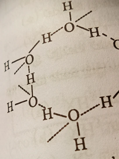 Close-up of a peptide chain model highlighting amino acid connections.