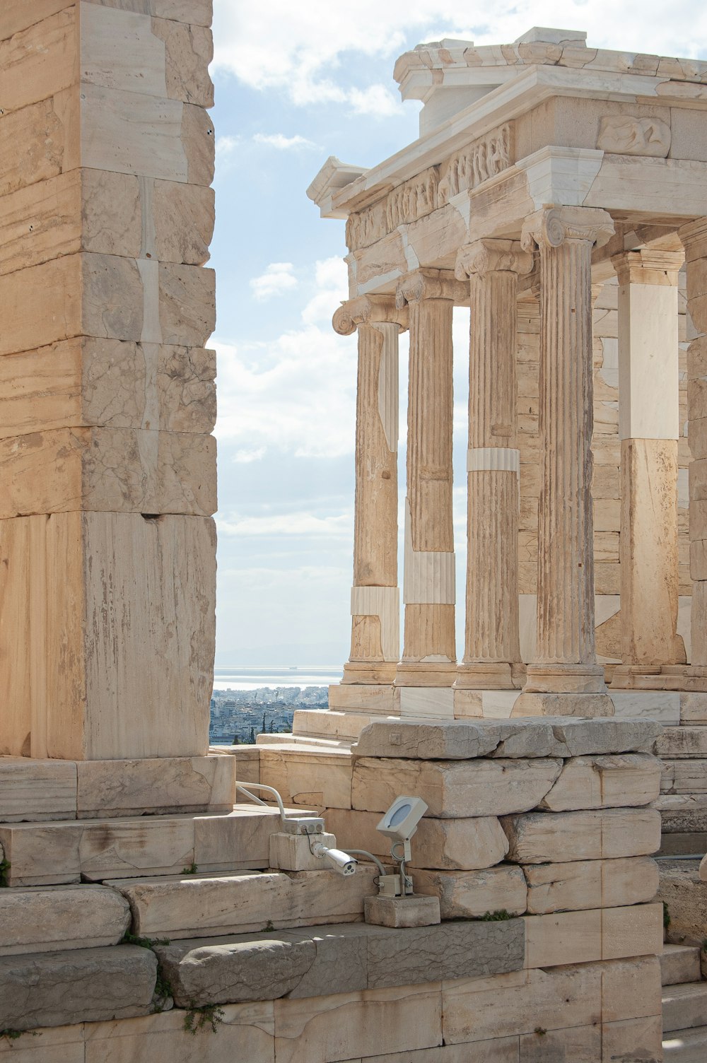 a couple of stone pillars sitting next to each other