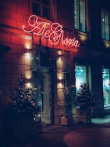 A welcoming office entrance of bob’s hollywood real estate with clear signage and warm lighting.