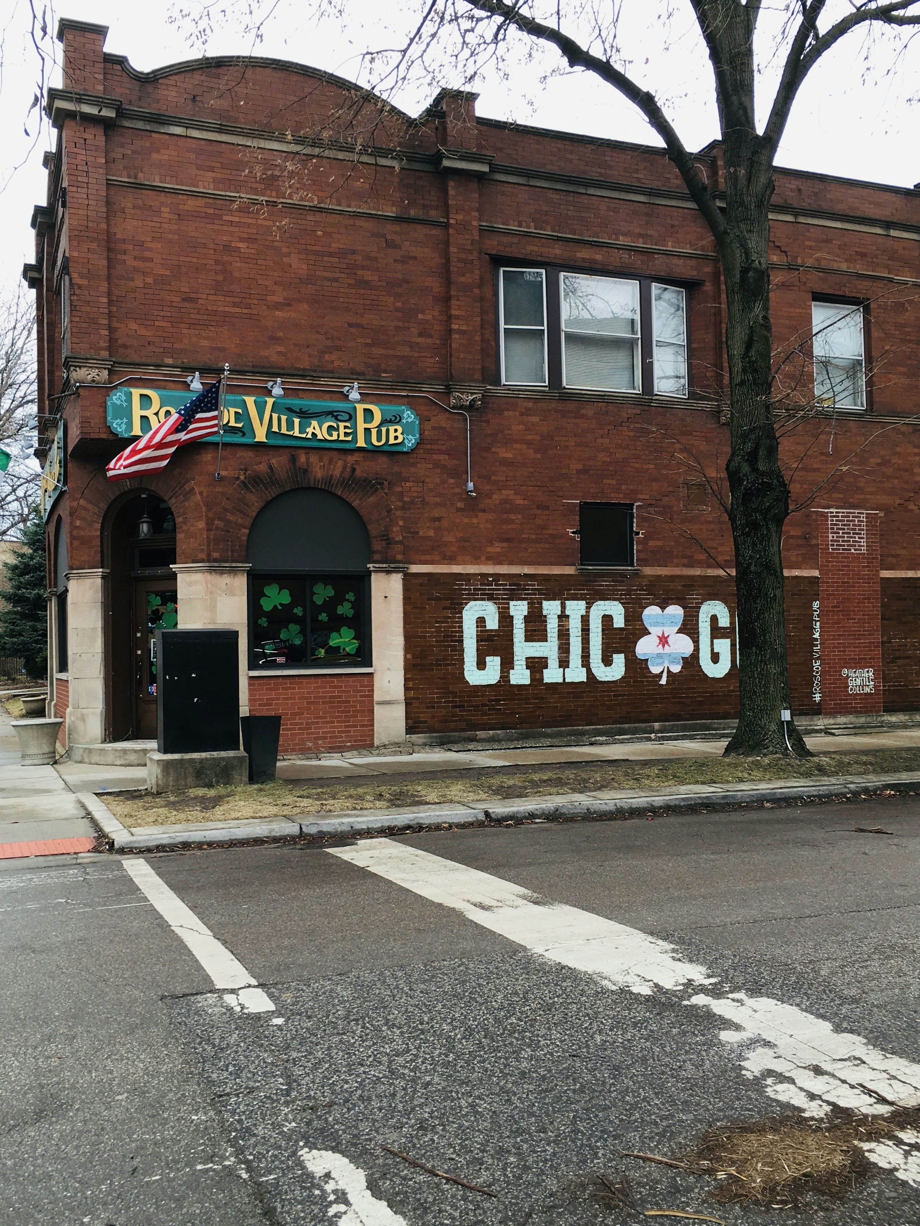 a brick building with a sign on the side of it