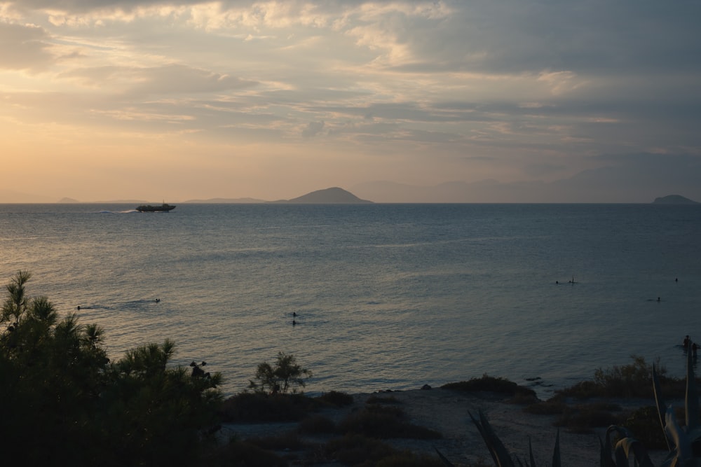 a body of water with a boat in the distance